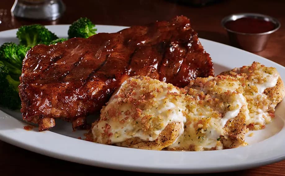 9 oz. Parmesan Crusted Chicken with Half-Rack Baby Back Ribs - Grill Master Combos 9 oz. Parmesan Crusted Chicken with Half-Rack Baby Back Ribs - Grill Master Combos on LongHorn Steakhouse menu