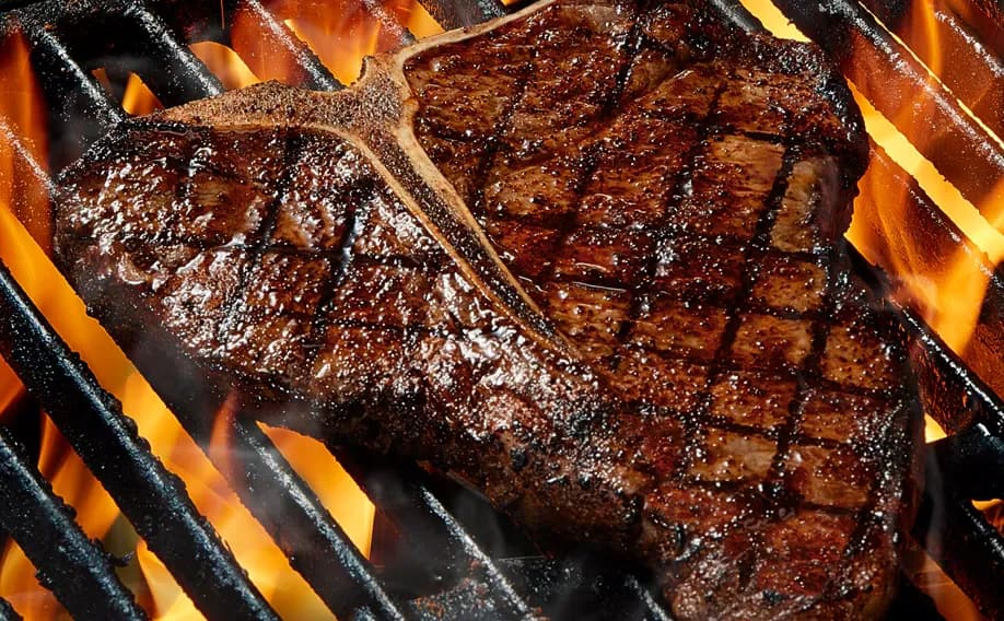 Fire-Grilled T-Bone* - Legendary Steaks Fire-Grilled T-Bone* - Legendary Steaks on LongHorn Steakhouse menu