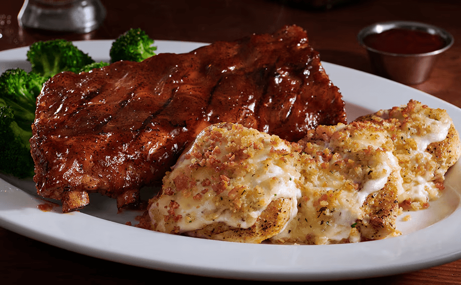 9 oz. Parmesan Crusted Chicken with Half-Rack Baby Back Ribs 9 oz. Parmesan Crusted Chicken with Half-Rack Baby Back Ribs